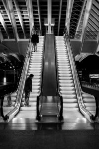 Man on escalator - Liege, Belgium (2015)