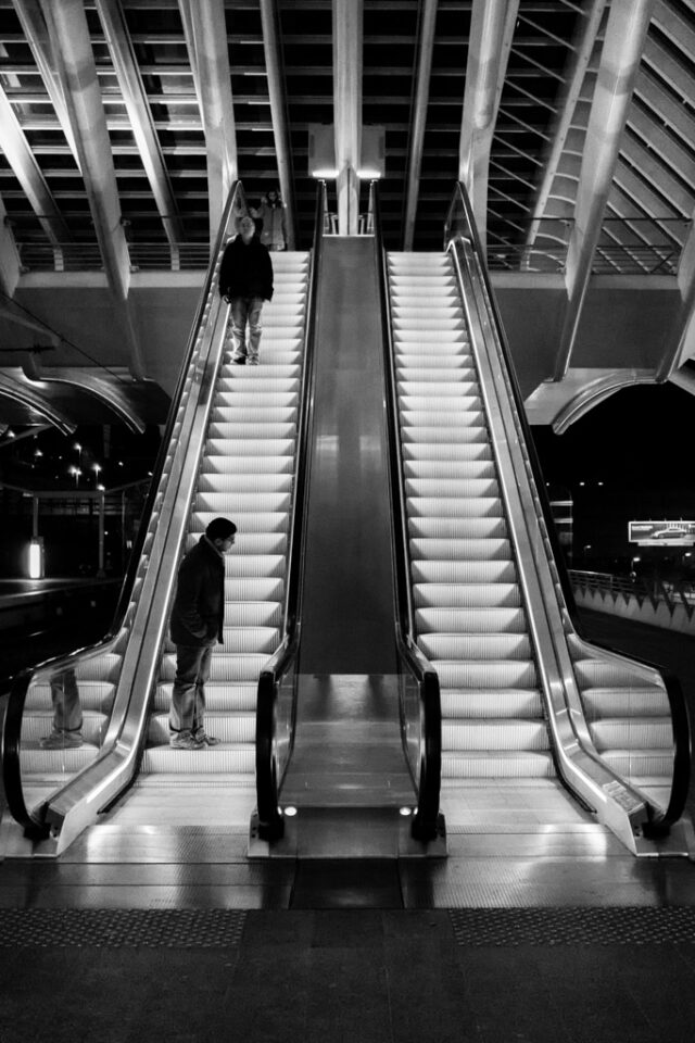 Man on escalator - Liege, Belgium (2015)